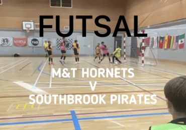 Futsal team in action