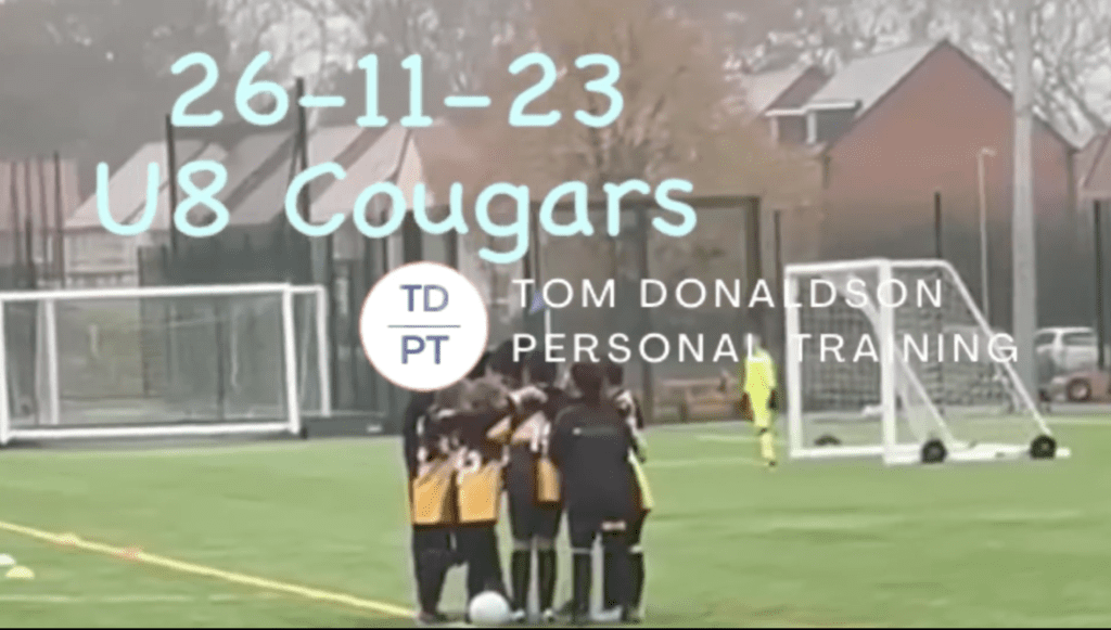 Cougars in a huddle