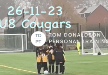 Cougars in a huddle