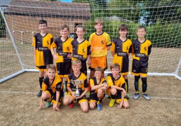 Michelmersh and Timsbury Jaguars with the trophy